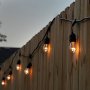 Brightech - Ambience Pro - Outdoor Weatherproof Commercial Grade String Lights with Hanging Sockets - WeatherTite Technology - 11S14 Incandescent Bulbs - Heavy Duty 48-Foot String - Black